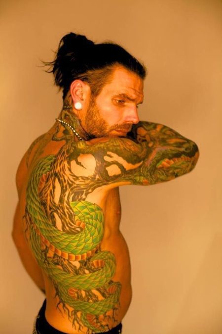 Jeff Hardy's snake wrapped around the roots tattoo.